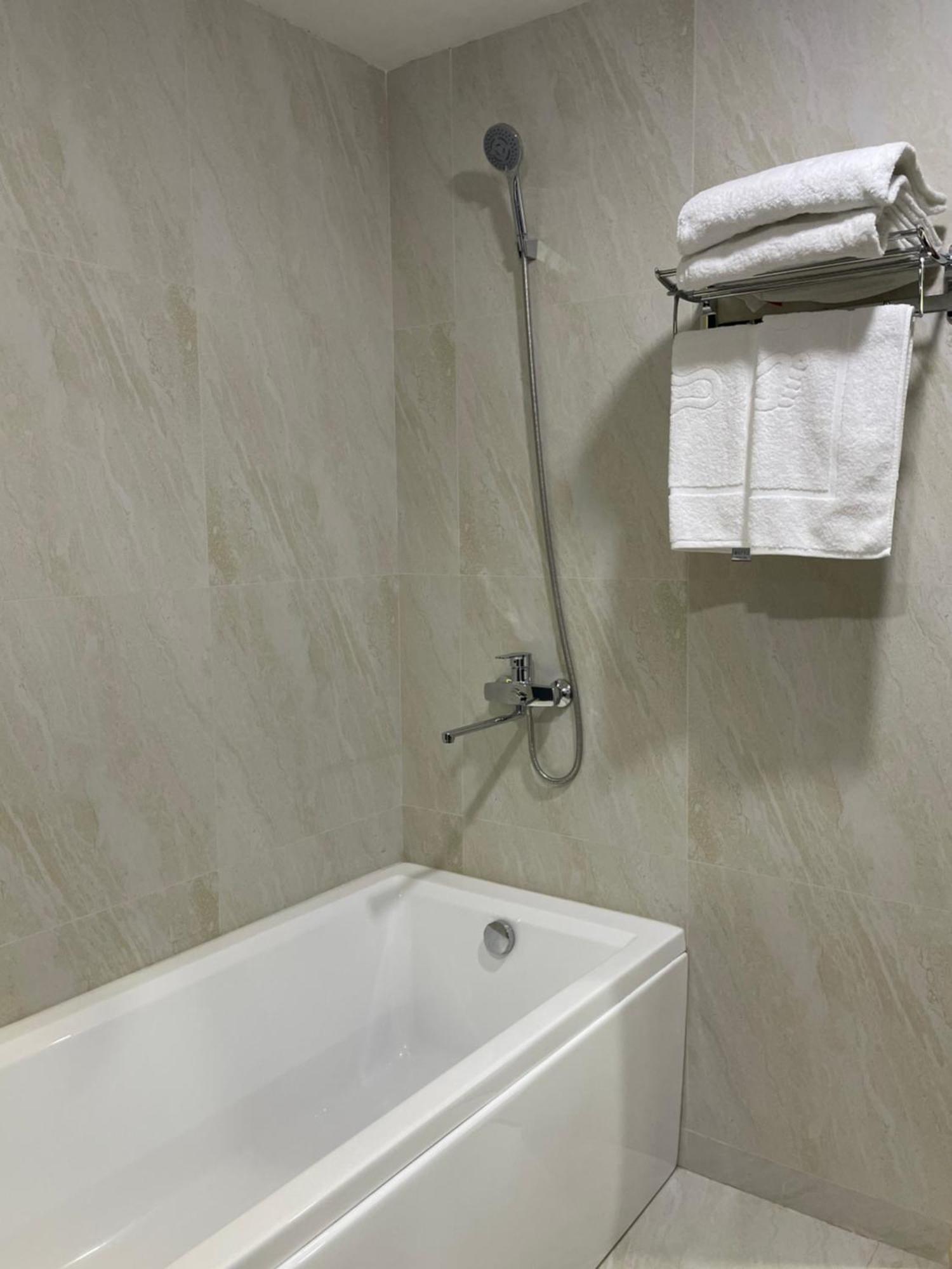 Asson Hotel Термиз Екстериор снимка